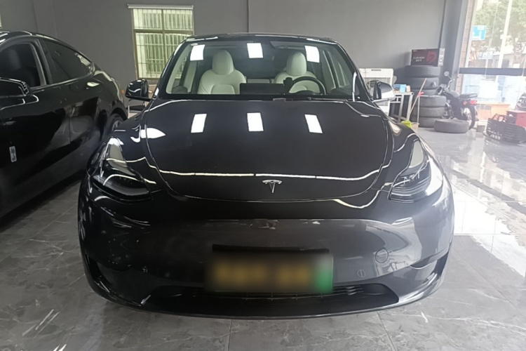 Tesla Model Y 2024 #3 Tesla Model Y 2024 car image #3