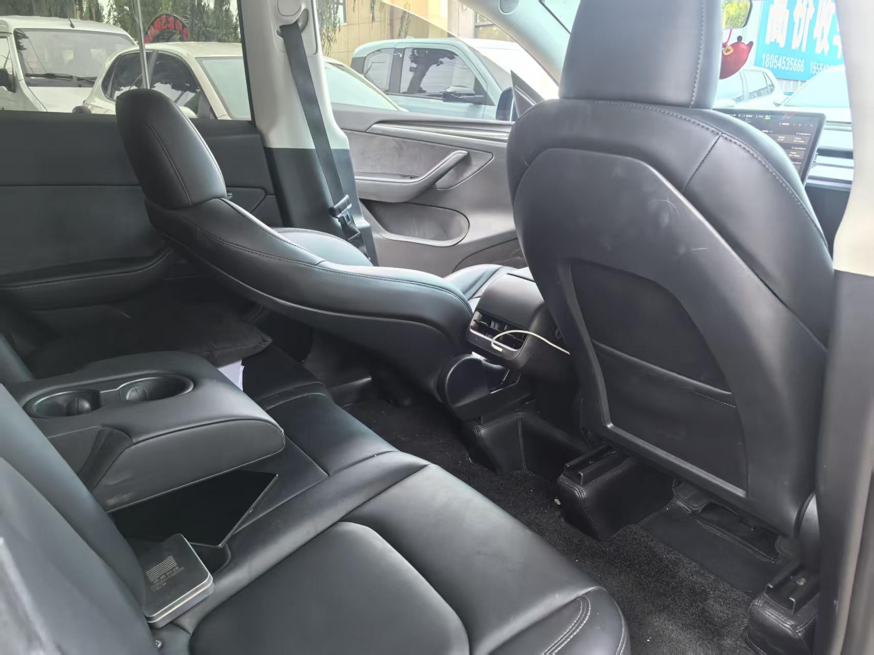 Tesla Model Y 2024 #9 Tesla Model Y 2024 car image #9