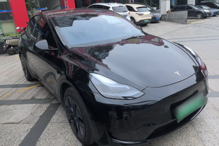 Tesla Model Y 2023 #4 Tesla Model Y 2023 car image #4