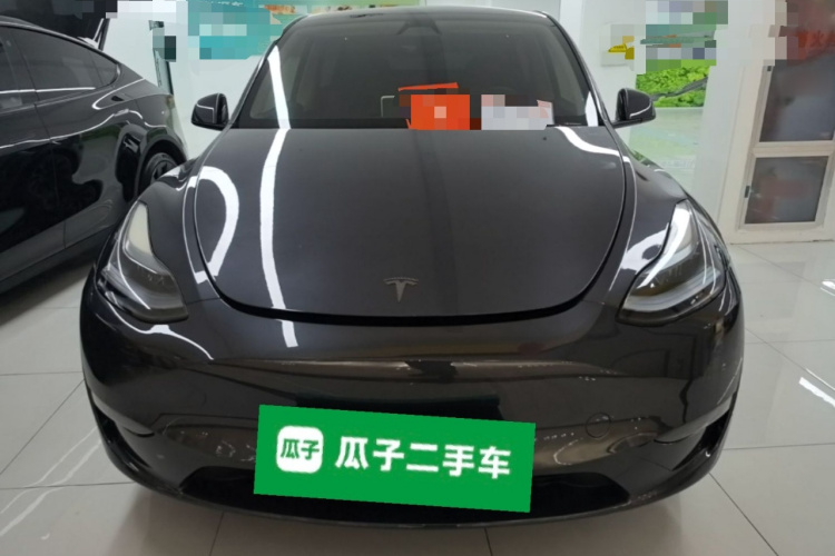 Tesla Model Y 2024 #3 Tesla Model Y 2024 car image #3