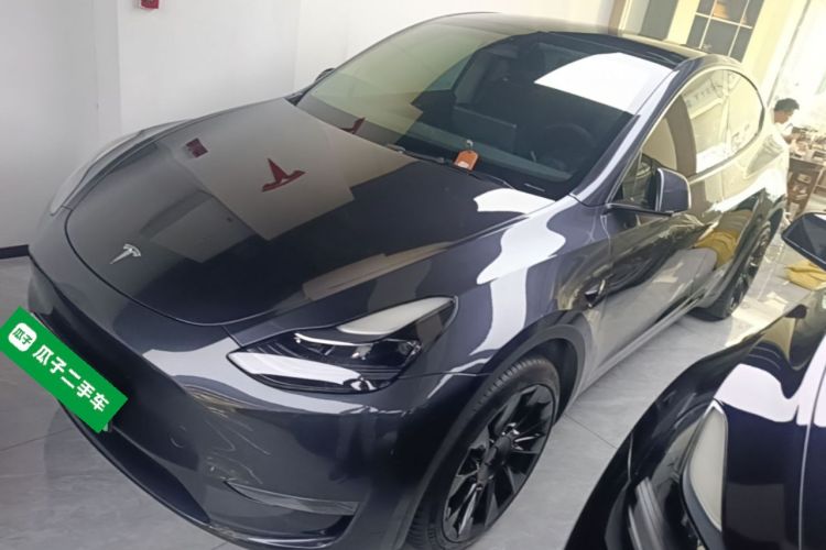Tesla Model Y 2024 #2 Tesla Model Y 2024 car image #2