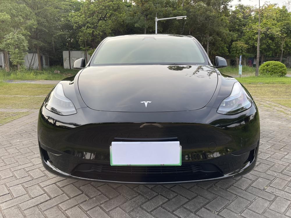 Tesla Model Y 2024 #2 Tesla Model Y 2024 car image #2