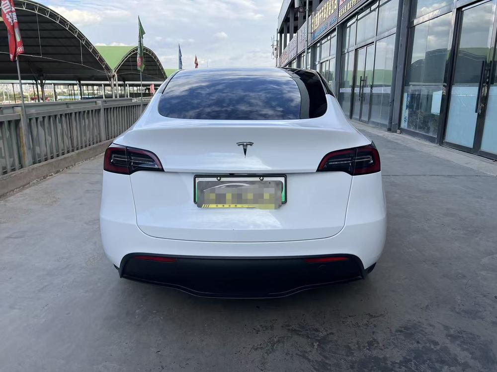 Tesla Model Y 2023 #5 Tesla Model Y 2023 car image #5