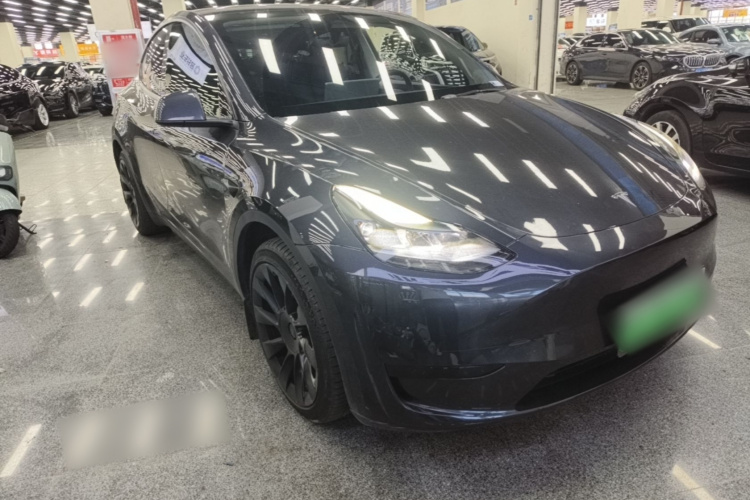 Tesla Model Y 2024 #4 Tesla Model Y 2024 car image #4