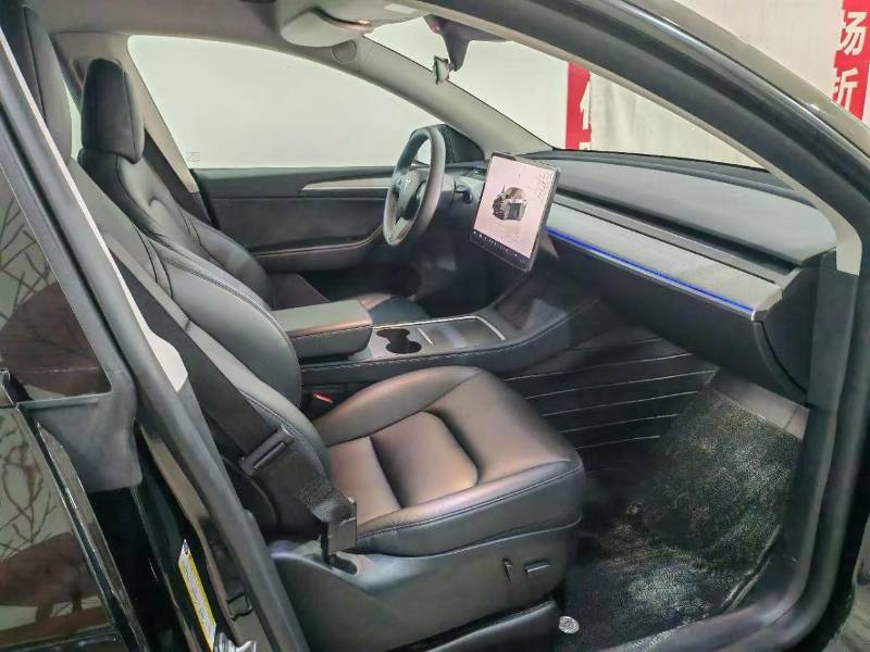Tesla Model Y 2024 #4 Tesla Model Y 2024 car image #4