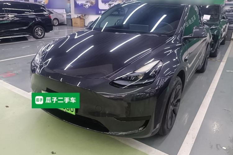 Tesla Model Y 2024 #2 Tesla Model Y 2024 car image #2