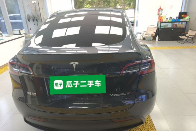 Tesla Model Y 2024 #6 Tesla Model Y 2024 car image #6