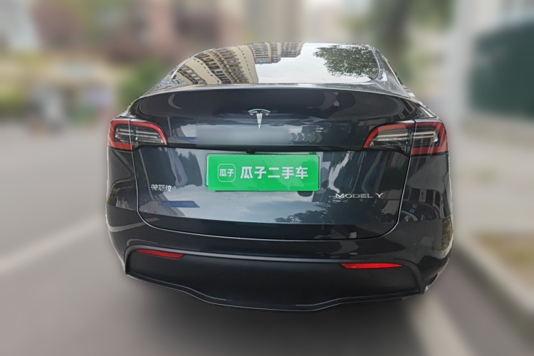 Tesla Model Y 2024 #4 Tesla Model Y 2024 car image #4