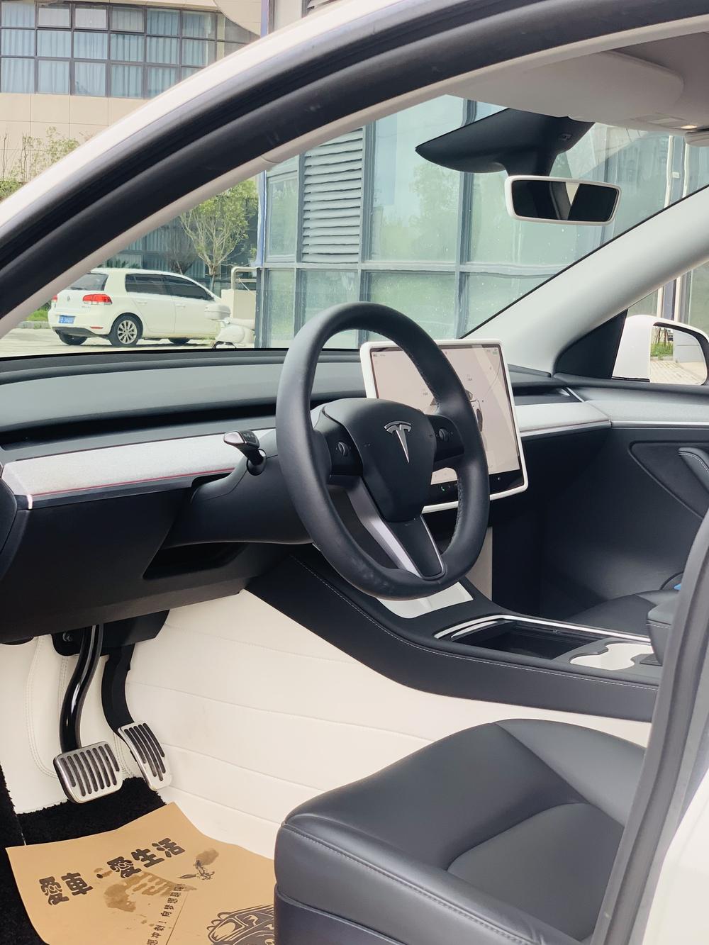 Tesla Model Y 2024 #9 Tesla Model Y 2024 car image #9