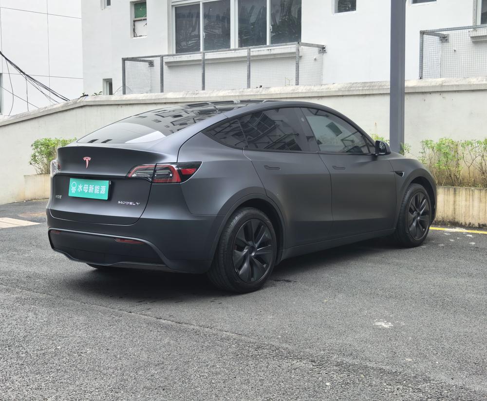 Tesla Model Y 2024 #6 Tesla Model Y 2024 car image #6