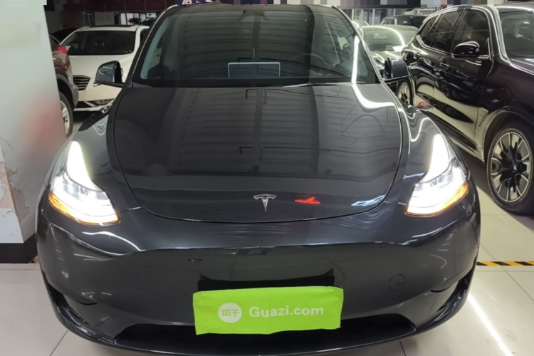 Tesla Model Y 2024 #3 Tesla Model Y 2024 car image #3