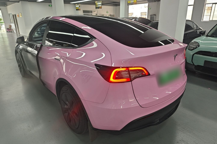 Tesla Model Y 2024 #7 Tesla Model Y 2024 car image #7