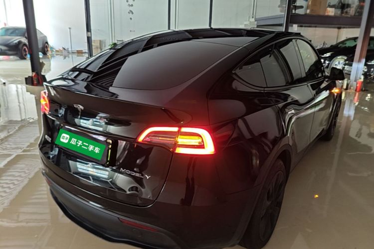 Tesla Model Y 2024 #7 Tesla Model Y 2024 car image #7