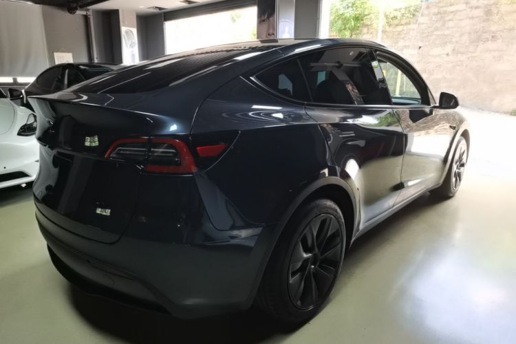 Tesla Model Y 2024 #7 Tesla Model Y 2024 car image #7