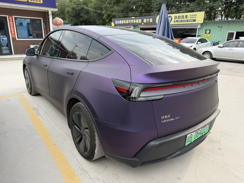 Tesla Model Y 2025 #7 Tesla Model Y 2025 car image #7