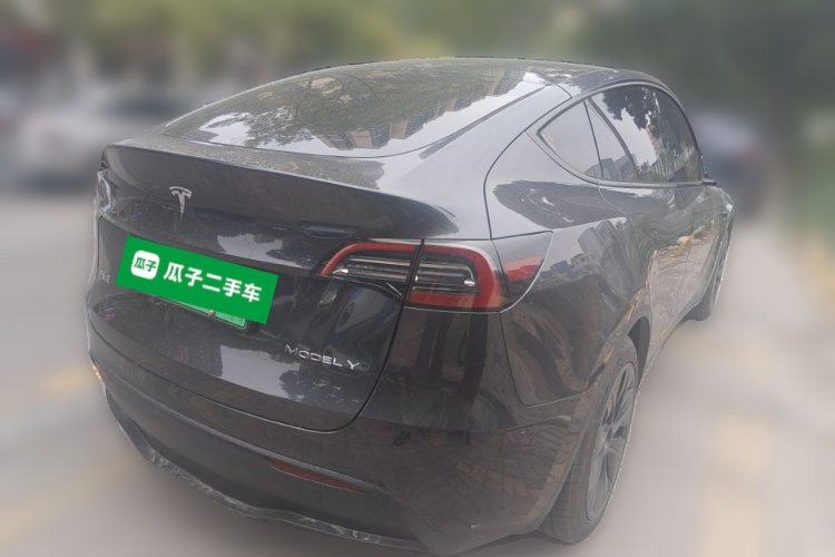 Tesla Model Y 2024 #5 Tesla Model Y 2024 car image #5