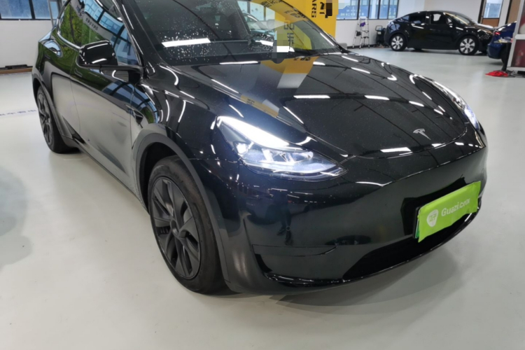 Tesla Model Y 2024 #4 Tesla Model Y 2024 car image #4