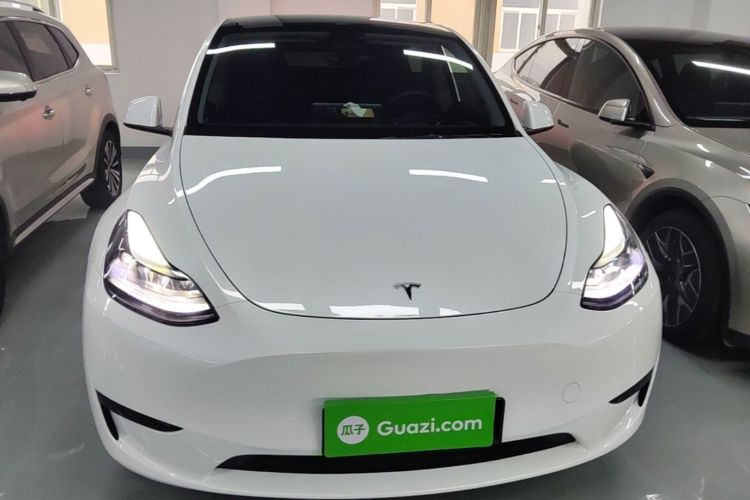 Tesla Model Y 2024 #3 Tesla Model Y 2024 car image #3