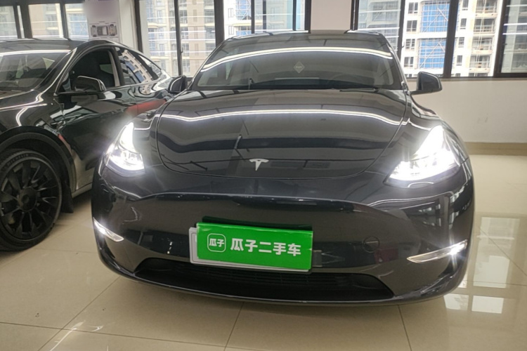 Tesla Model Y 2024 #3 Tesla Model Y 2024 car image #3