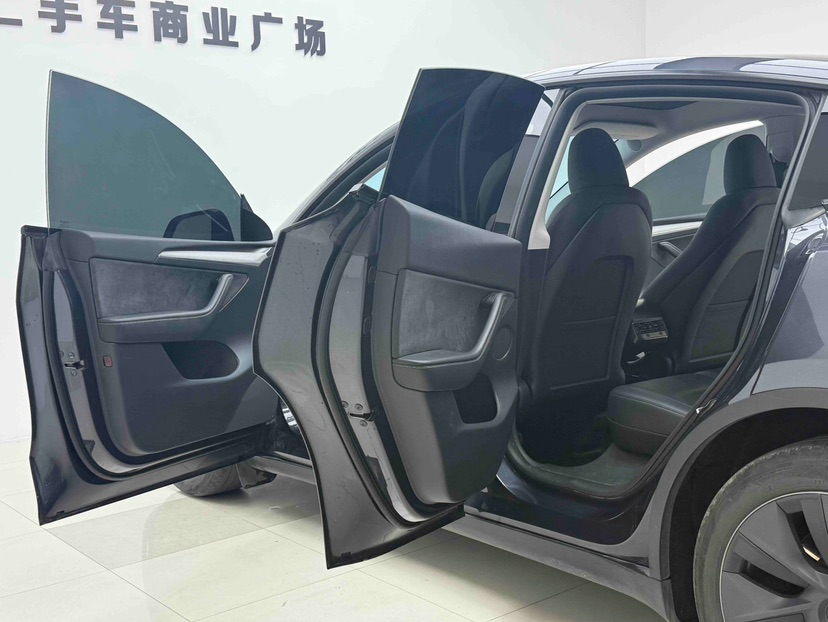 Tesla Model Y 2024 #3 Tesla Model Y 2024 car image #3
