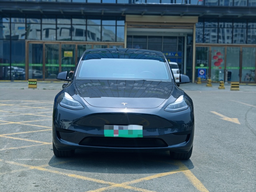 Tesla Model Y 2024 #2 Tesla Model Y 2024 car image #2