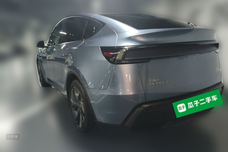 Tesla Model Y 2025 #5 Tesla Model Y 2025 car image #5