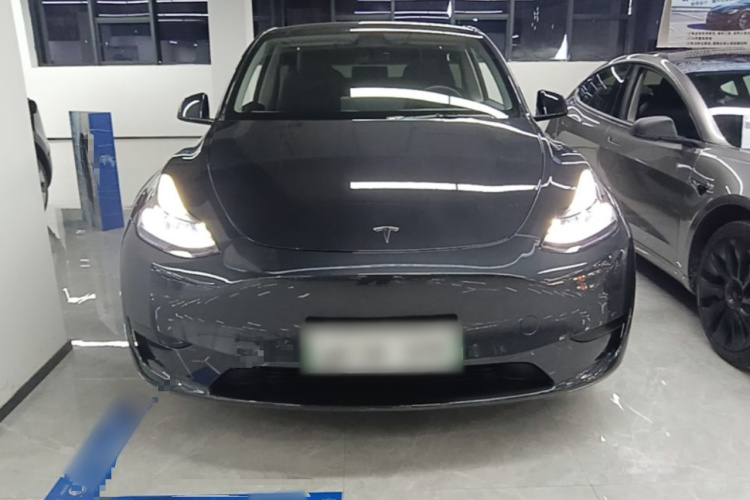 Tesla Model Y 2024 #3 Tesla Model Y 2024 car image #3