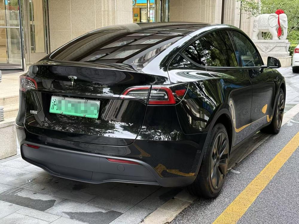Tesla Model Y 2023 #6 Tesla Model Y 2023 car image #6