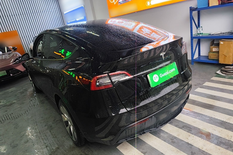 Tesla Model Y 2023 #5 Tesla Model Y 2023 car image #5