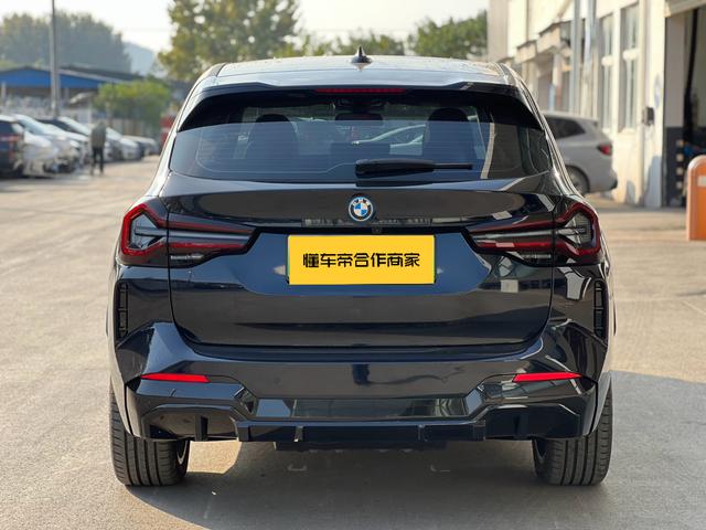 BMW iX3 2024 immagine di auto #6