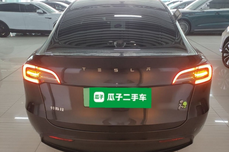 Tesla Model Y 2024 #6 Tesla Model Y 2024 immagine di auto #6