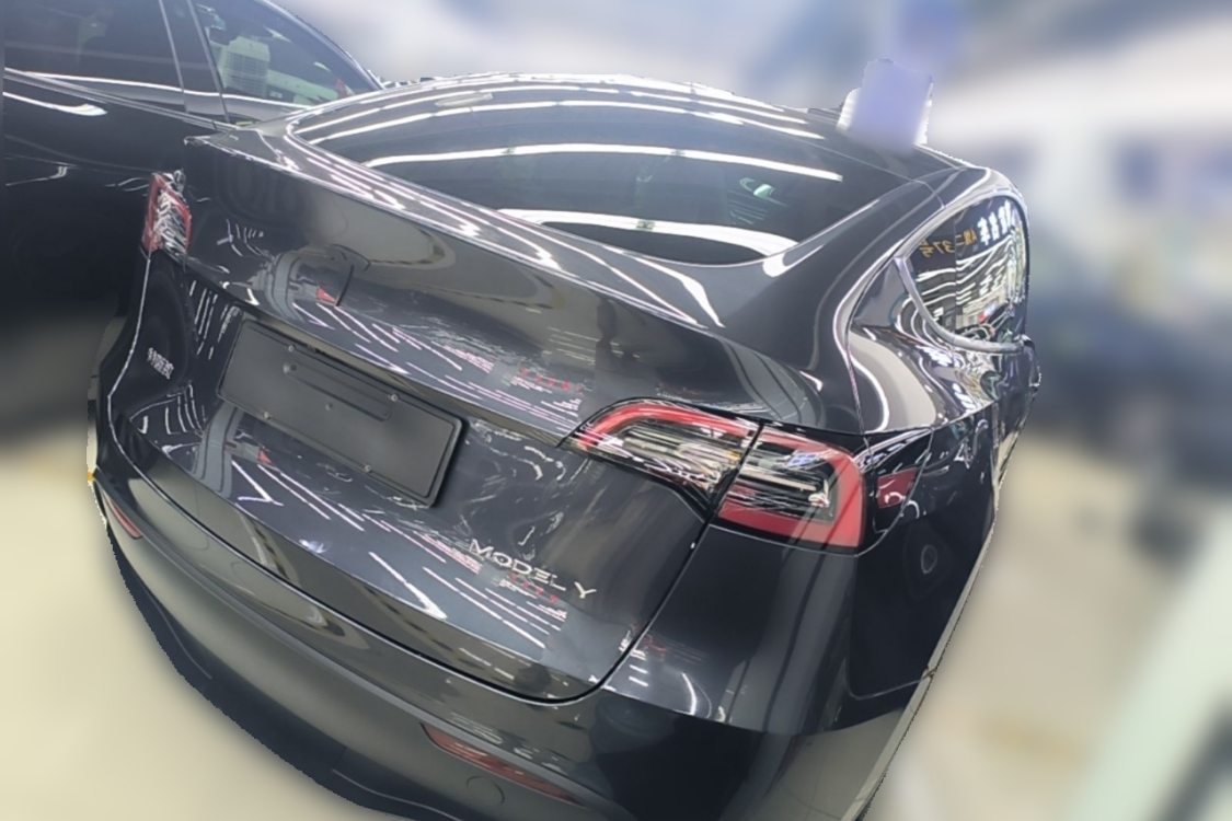 Tesla Model Y 2024 #4 Tesla Model Y 2024 car image #4