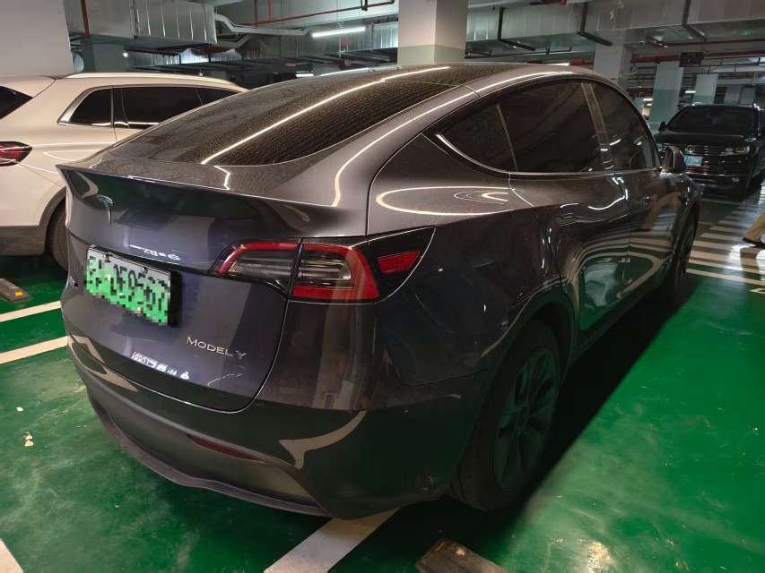 Tesla Model Y 2024 #5 Tesla Model Y 2024 car image #5