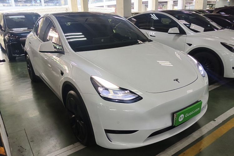 Tesla Model Y 2024 #4 Tesla Model Y 2024 car image #4
