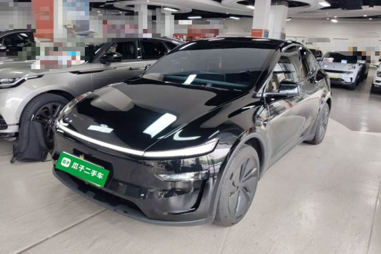 Tesla Model Y 2025 #2 Tesla Model Y 2025 car image #2