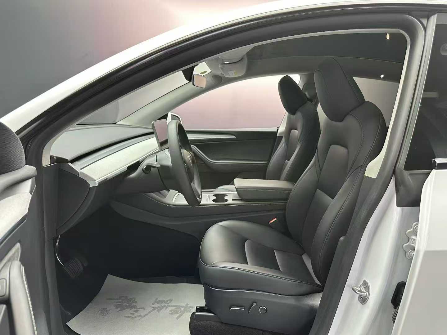 Tesla Model Y 2024 #3 Tesla Model Y 2024 car image #3