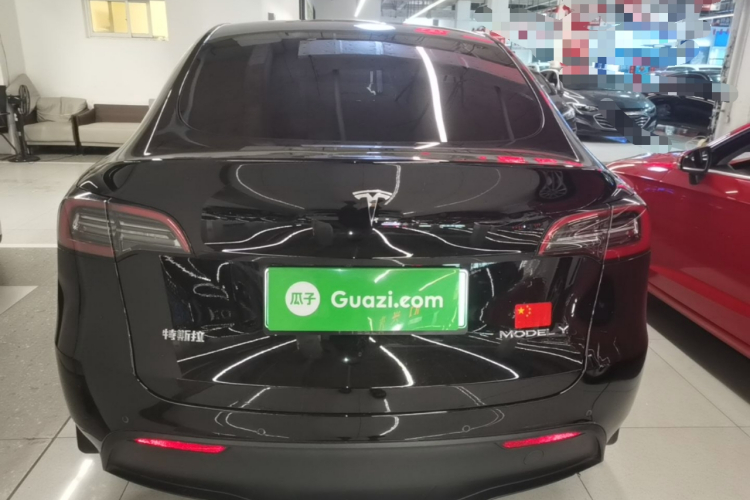 Tesla Model Y 2024 #6 Tesla Model Y 2024 car image #6