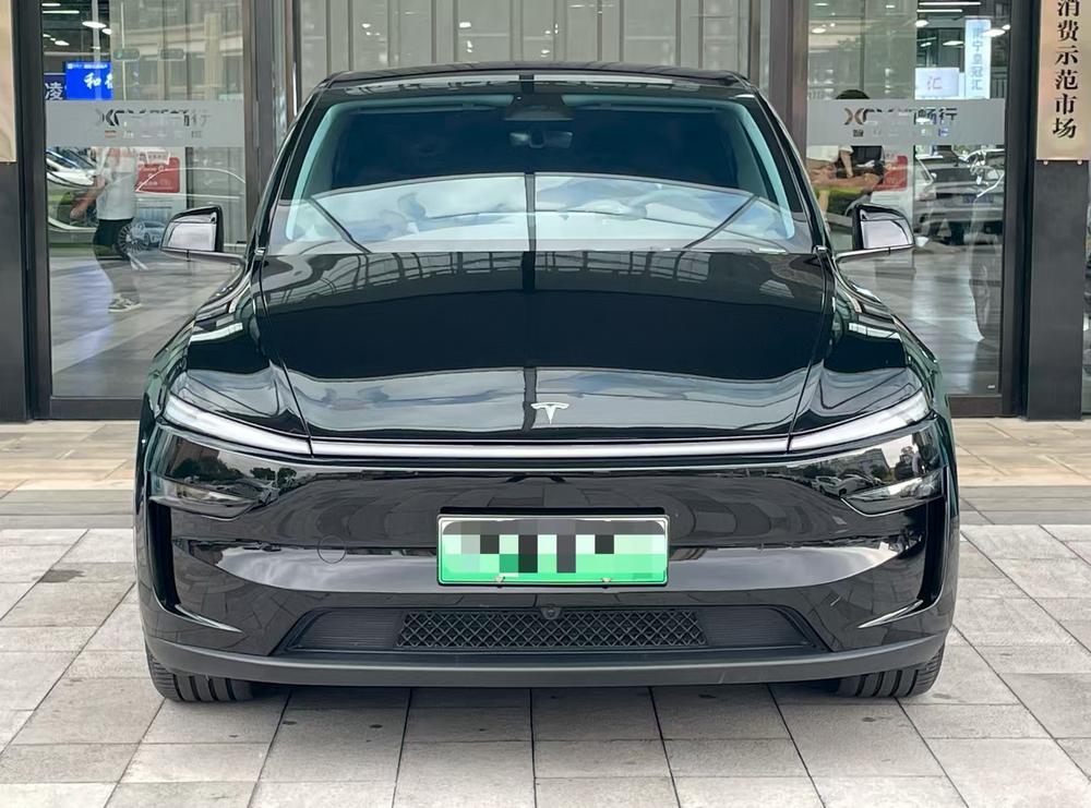 Tesla Model Y 2025 #2 Tesla Model Y 2025 car image #2