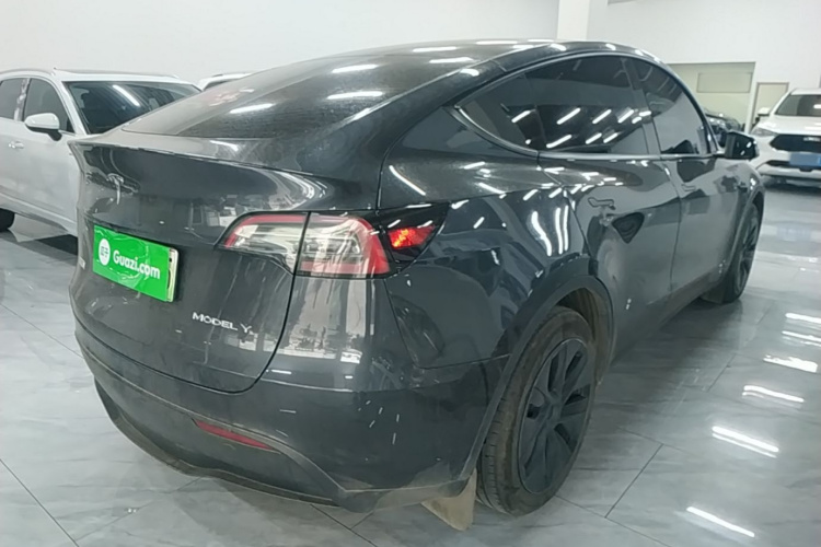 Tesla Model Y 2024 #5 Tesla Model Y 2024 car image #5