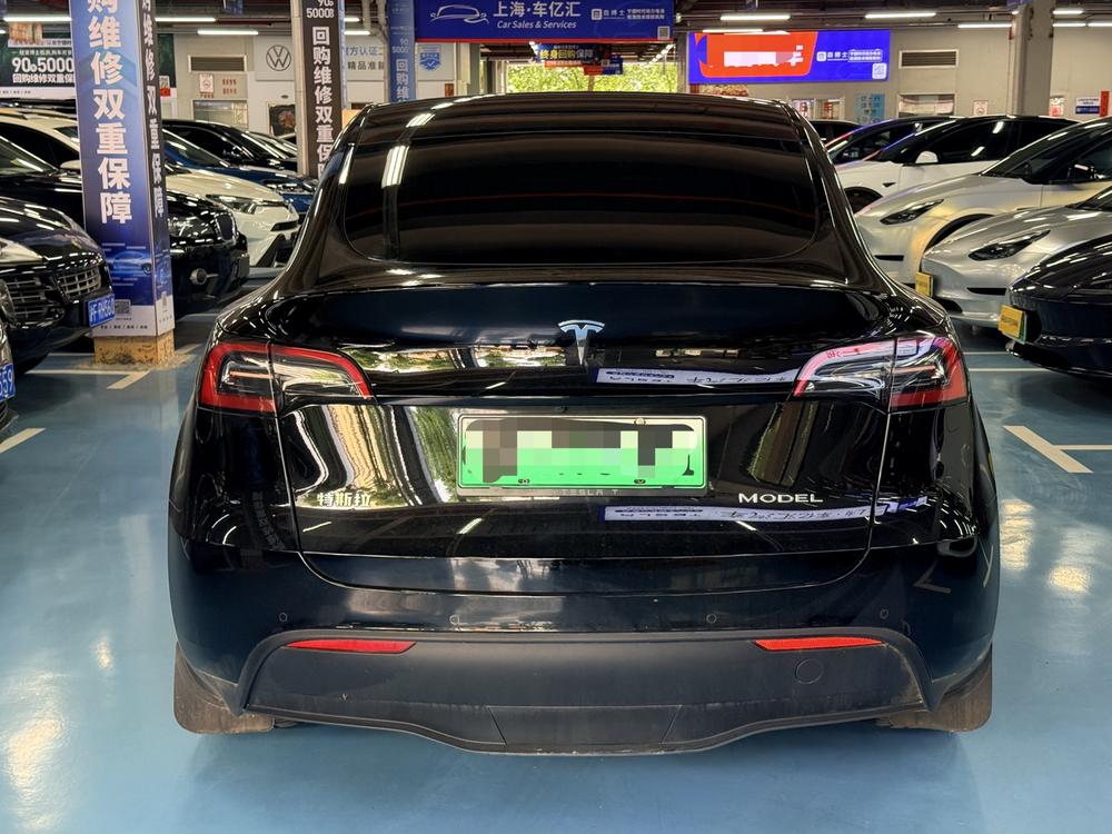Tesla Model Y 2023 #5 Tesla Model Y 2023 car image #5