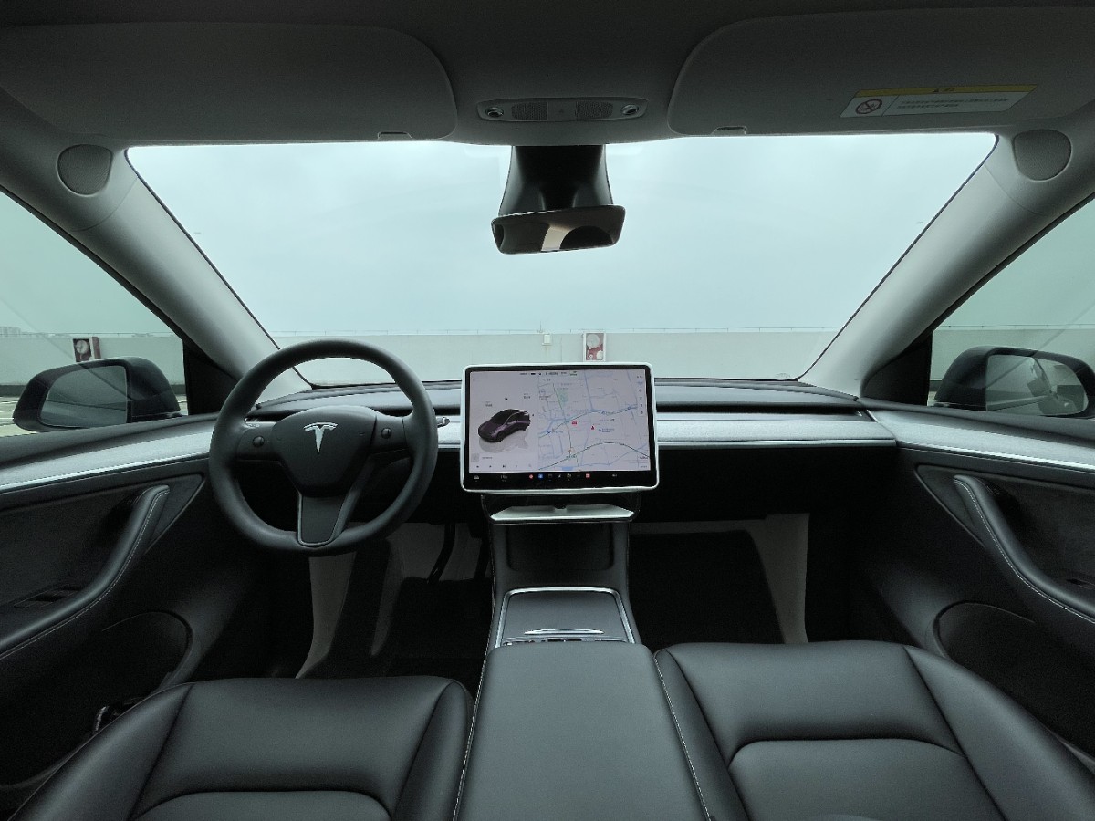 Tesla Model Y 2024 #7 Tesla Model Y 2024 car image #7