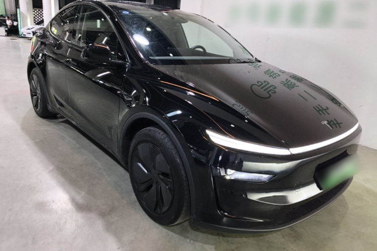Tesla Model Y 2025 #4 Tesla Model Y 2025 car image #4