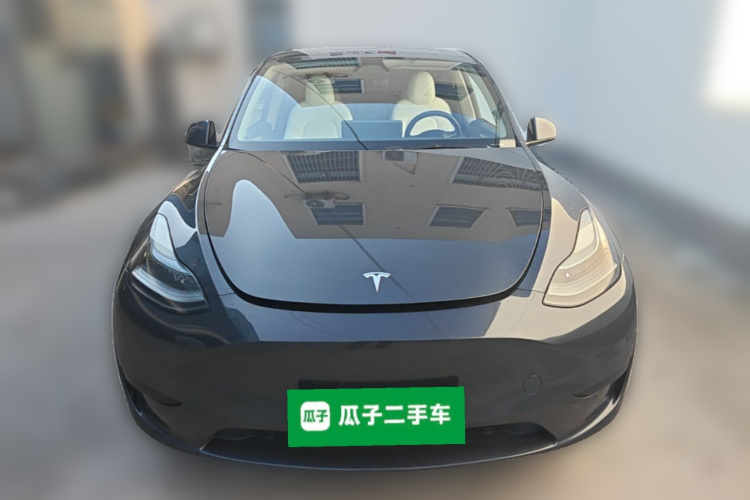 Tesla Model Y 2024 #3 Tesla Model Y 2024 car image #3