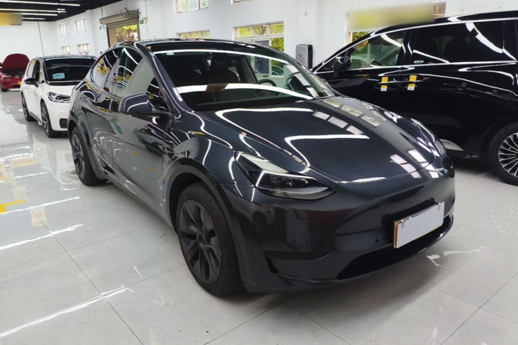 Tesla Model Y 2024 #4 Tesla Model Y 2024 car image #4