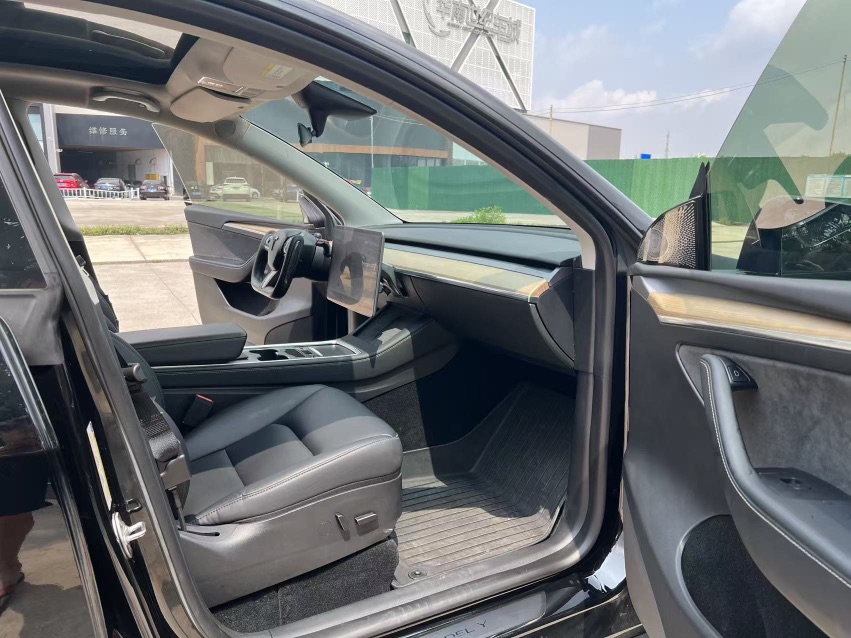 Tesla Model Y 2023 #4 Tesla Model Y 2023 car image #4