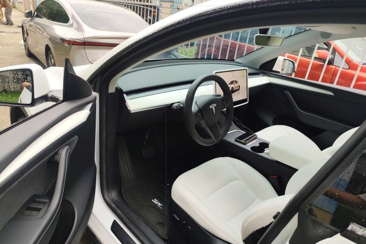 Tesla Model Y 2023 #16 Tesla Model Y 2023 car image #16