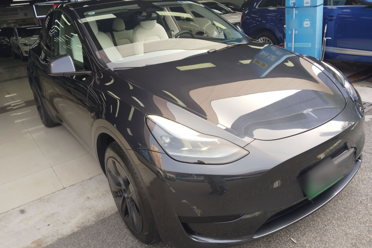 Tesla Model Y 2024 #4 Tesla Model Y 2024 car image #4