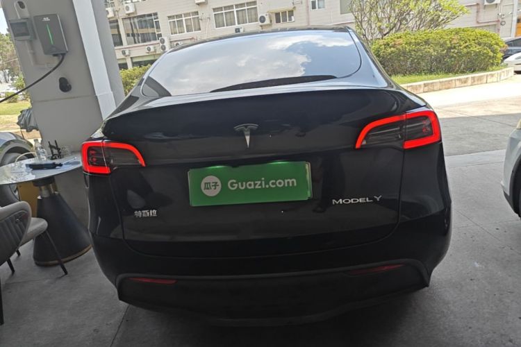Tesla Model Y 2024 #6 Tesla Model Y 2024 car image #6