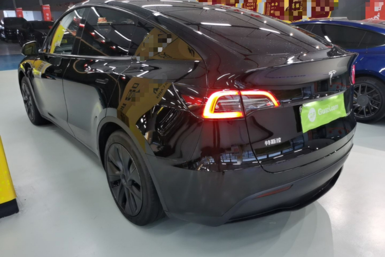 Tesla Model Y 2024 #5 Tesla Model Y 2024 car image #5
