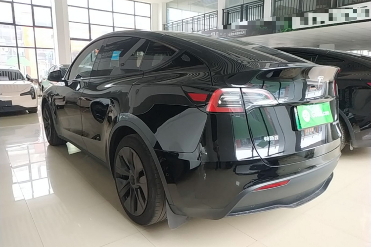 Tesla Model Y 2024 #5 Tesla Model Y 2024 car image #5